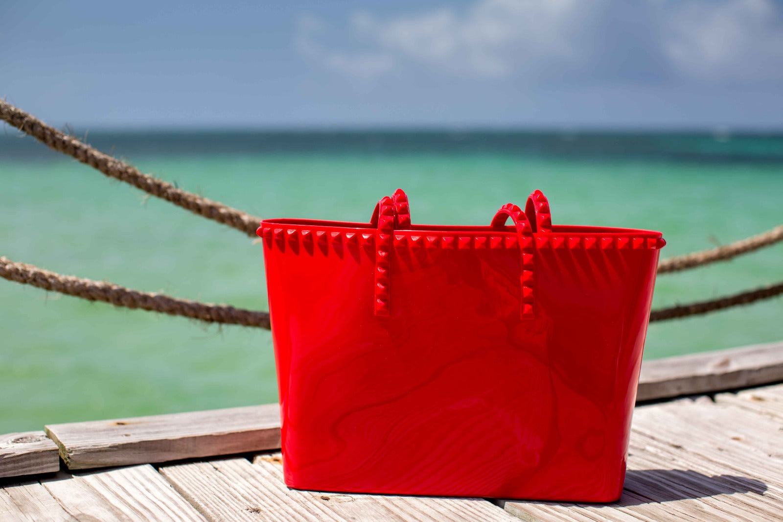 Waterproof Carmen Sol studded beach bags for women in color red