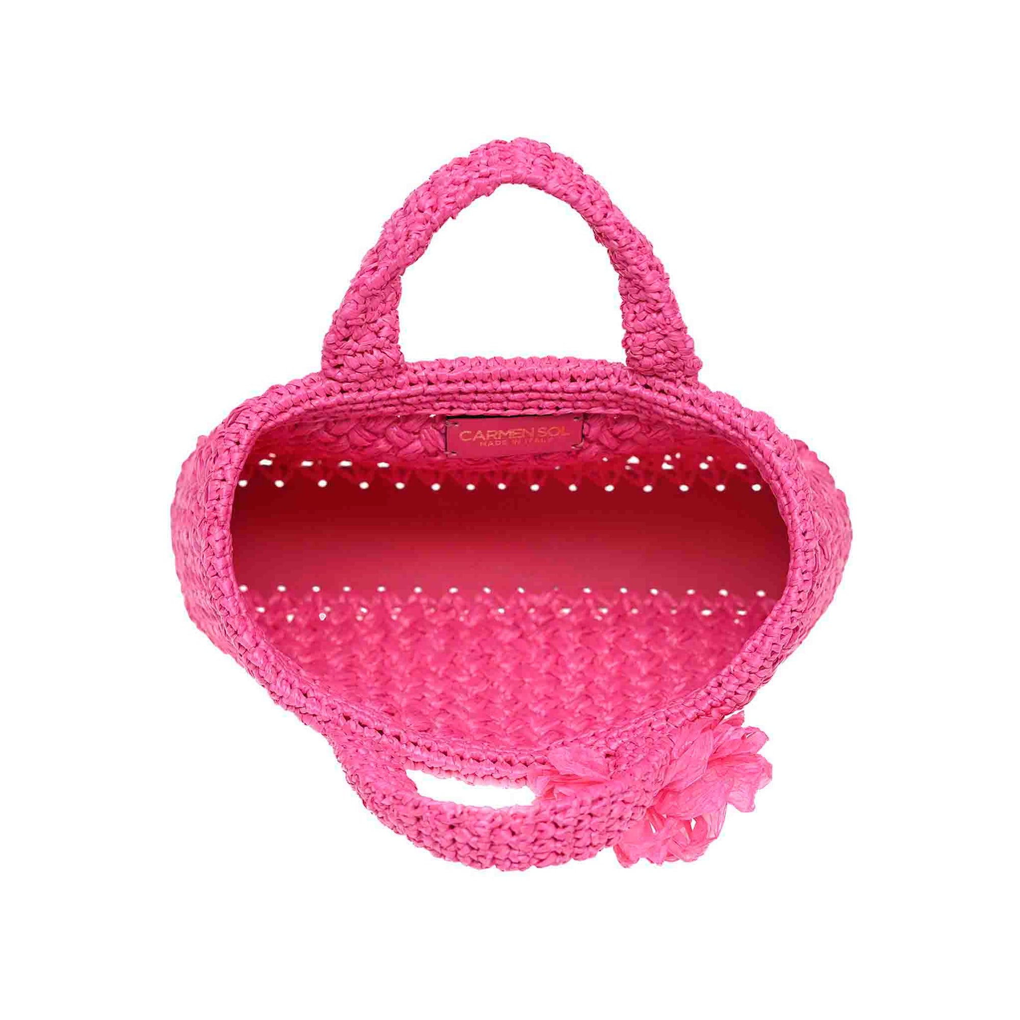 Small tote bag fuchsia in color from Carmen Sol hand woven raffia made in Italy.