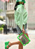 Green look with Balenciaga shirt and jelly wedges with a buckle green hat water proof and water resistant