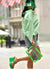 neon green clear purse paired with Carmen Sol bucket jelly hat and jelly wedges