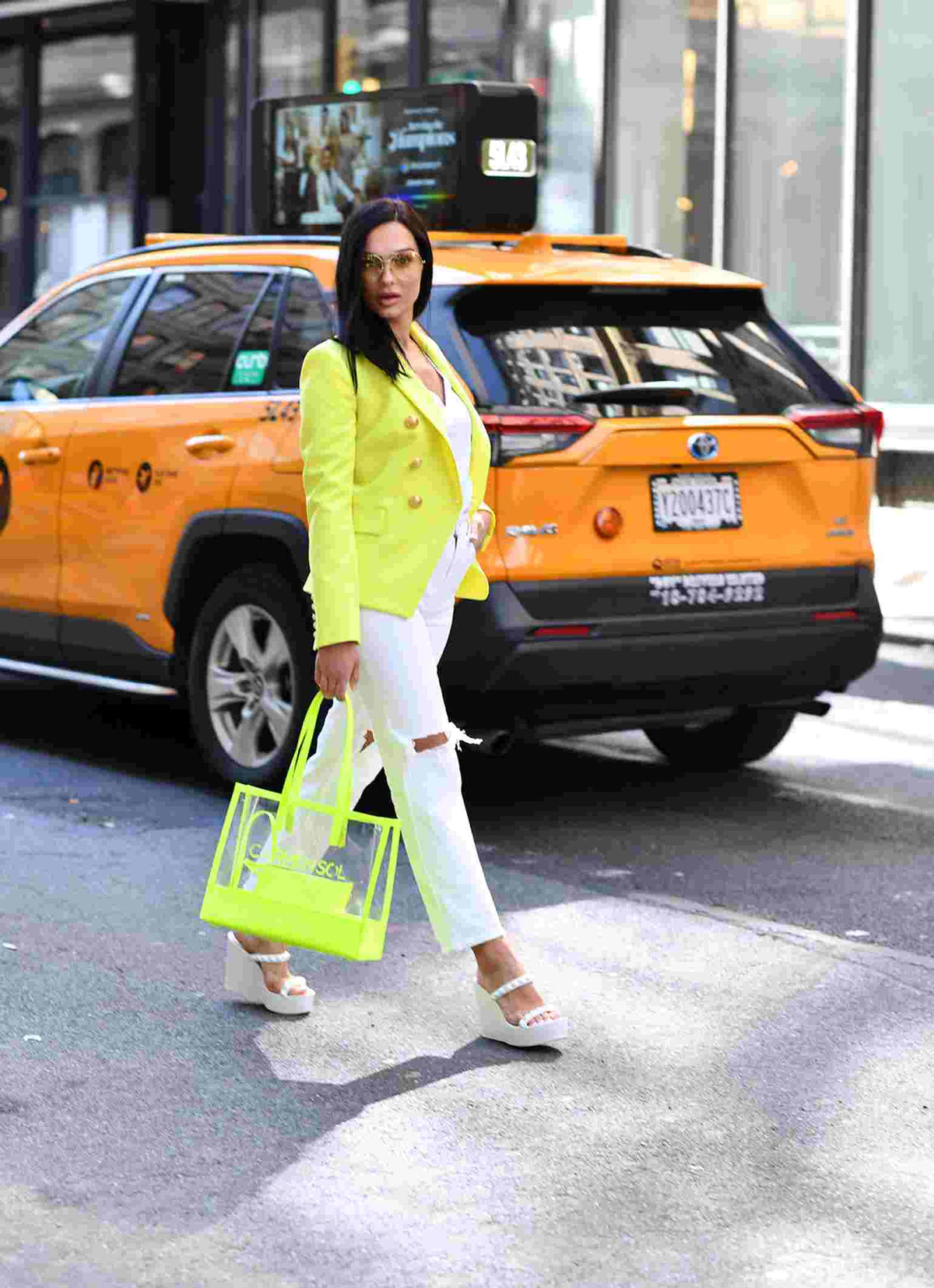 Vegan clear jelly purse in color neon yellow paired with jelly wedges