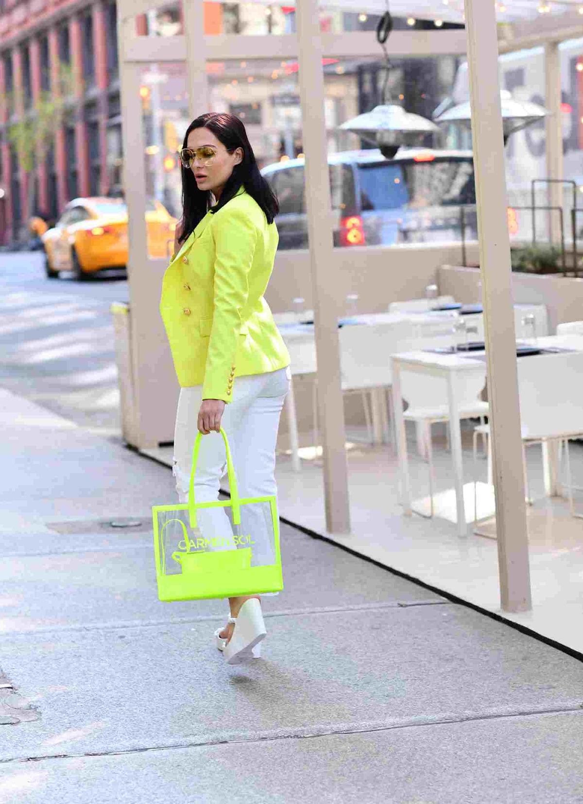 Carmen Sol clear jelly purse in color neon yellow paired with jelly wedges