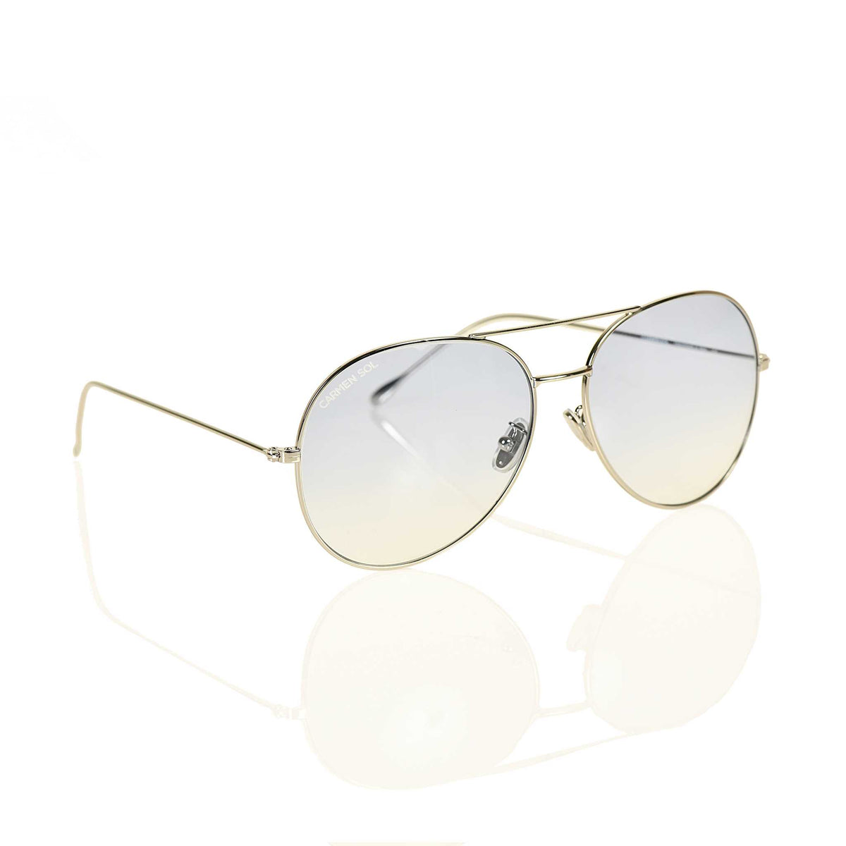 Gold sunglasses for women with tone on tone lenses