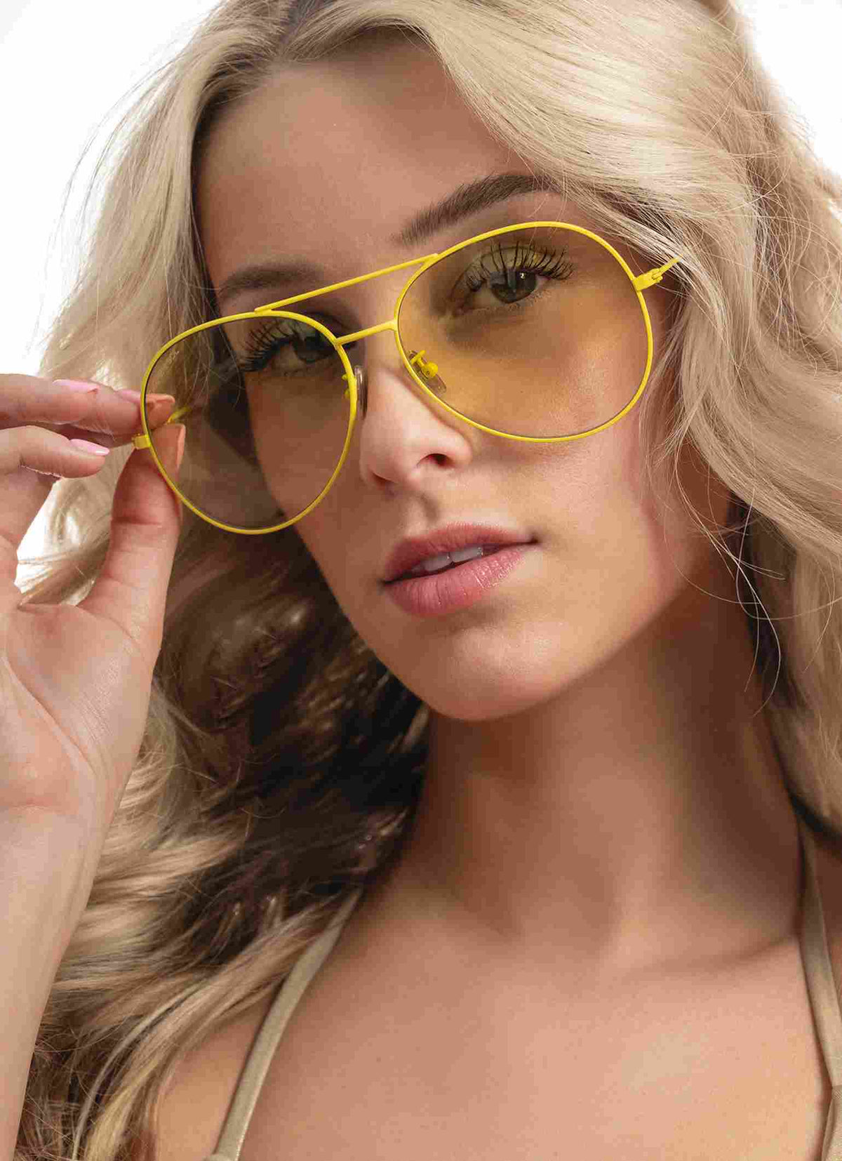 Yellow aviator sunglasses perfect beach companion from Carmen Sol. Sunglasses for women