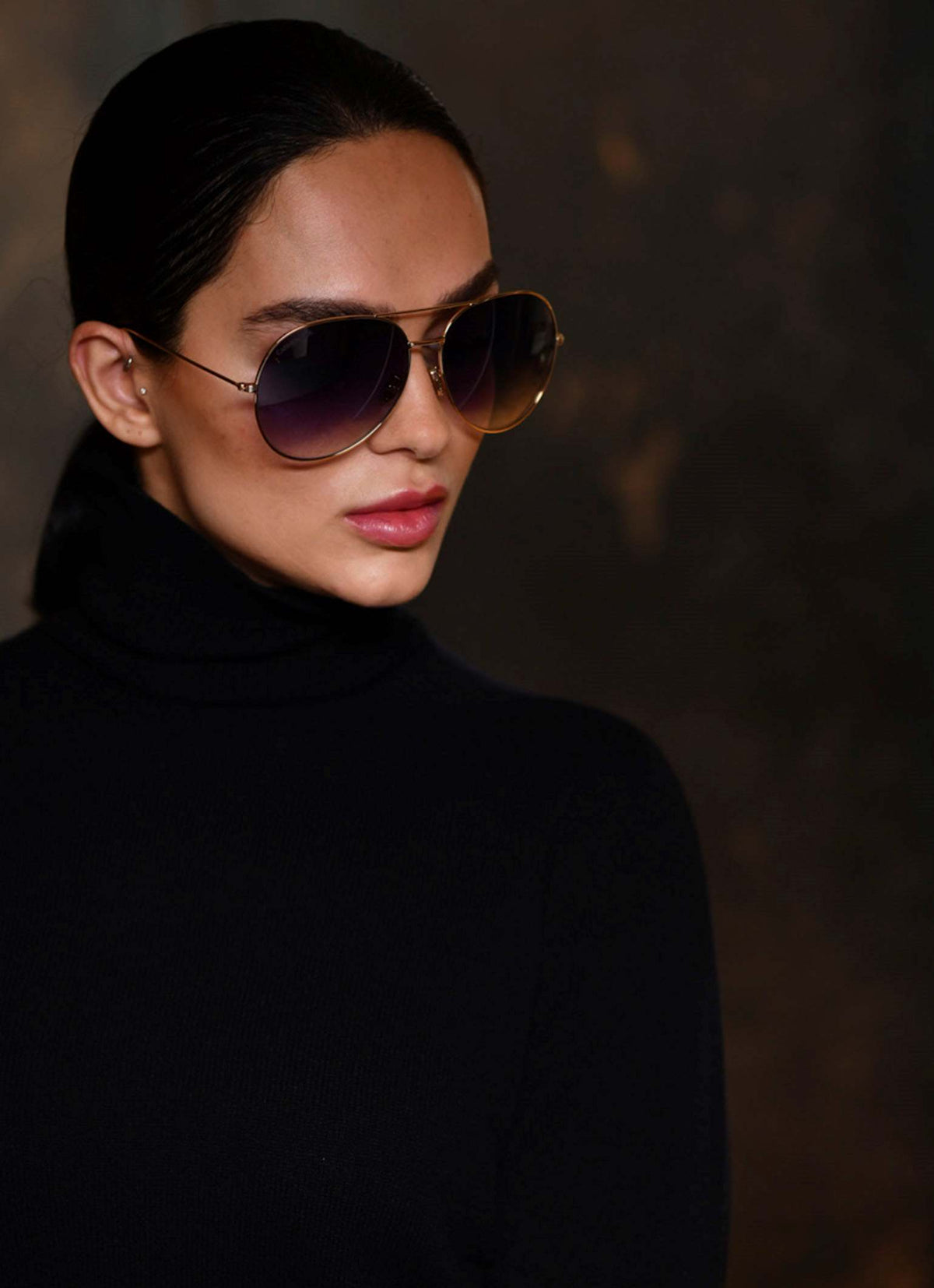Turtle neck cashmere sweater made in Italy with sunglasses in black lenses and gold frame
