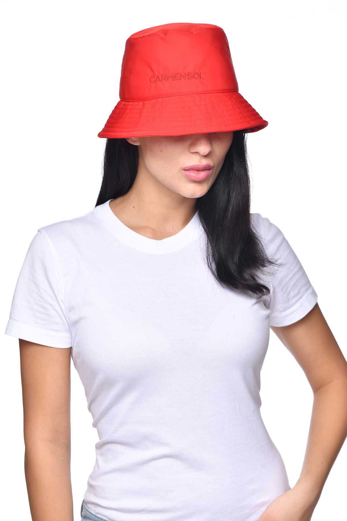 Women wearing Raquel nylon red bucket hat from Carmen Sol