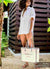 Roma large tote bag in color silver paired with Carmen Sol jelly sandals