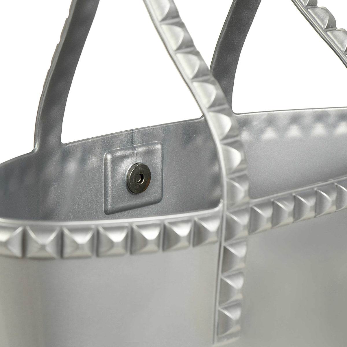 Sustainable Carmen Sol jumbo studded jelly purse in color silver