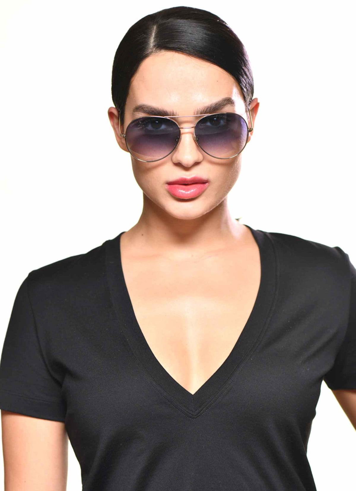 Silver sunglasses with black lenses with a pure cotton t-shirt a V neck