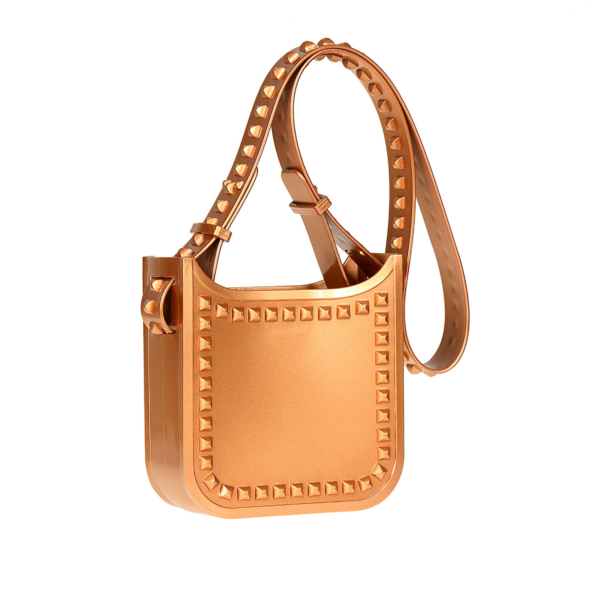 Rose gold metallic Lisa small crossbody purse from Carmen Sol on sale